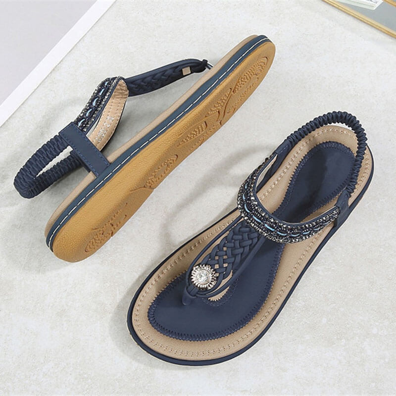 Women's flat gladiator sandals with crystal adornments, PU upper, and comfy rubber outsole. Stylish and light ladies shoes SF1064.